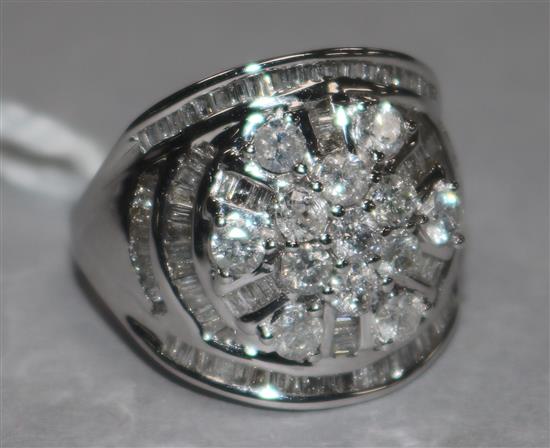 A diamond and 9ct white gold cluster ring